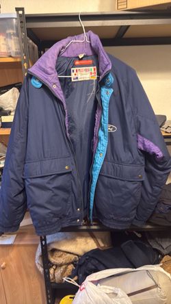 FORD vintage 1990s color-block winter jacket featuring a navy blue body, a high purple collar, and bright teal inner placket accents with front flap p