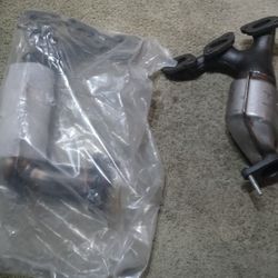 Both Sides Exhaust Manofolds For 3.0L Ford Escape, Mazda Tribute, Mercury Mariner.. New.. No Hardware or Gaskets