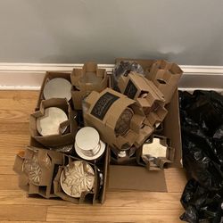 Several Boxes Of Bath And Body Works Candles