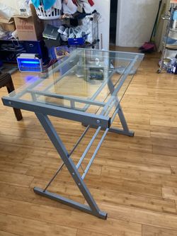30 inches tall computer table with two glass  top for $40