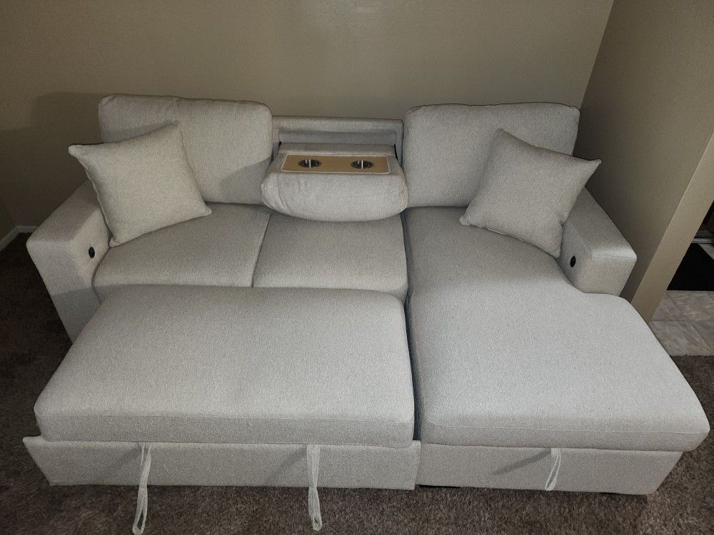 Sectional With Memory And Cupholders And Sleeper . Must Seee