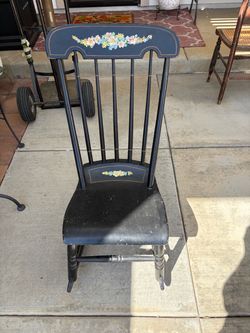 Black Wood Rocking Chair with Floral Detail