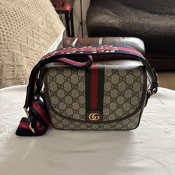 Gucci  