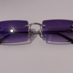 JAMES ORO Authentic II Sunglasses. Silver Frame. Purple tint