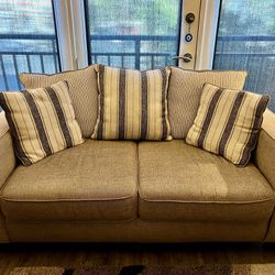 Tan Loveseat with Pillows