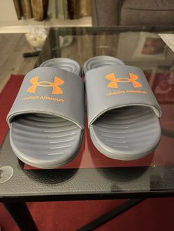 BRAND NEW UNDER ARMOUR SLIDES…SIZE 6Y