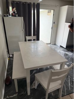 Dining room table + bench and chairs