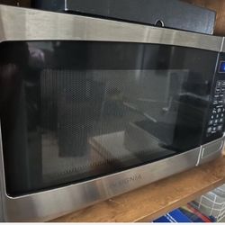 Insignia 0.9 Cu. Ft. Stainless Steel Compact Microwave Sleek & Efficien