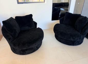 Black upholdered gramwell swivel chairs