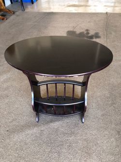 Nice lamp table with magazine rack.