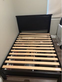 Black wooden twin size bed frame with all hardware sand slats