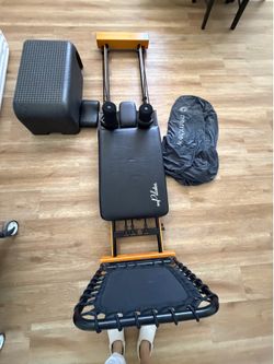 Pilates reformer with accessories