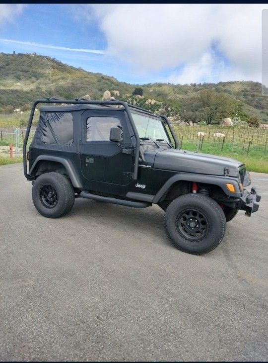 Jeep Wrangler TJ With Roof Rack Tires