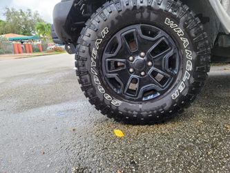 Moab jeep wrangler rims and tires.