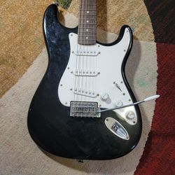 squier strat by fender electric guitar
