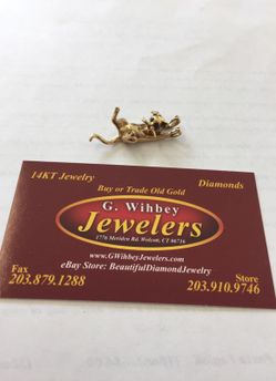 14 Kt real gold , not plated cat pendant
