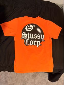 orange “Stüssy Corp.” 8ball tee