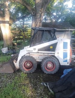 Post 743 Bobcat skid steer $12,000