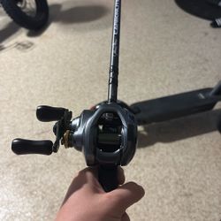 Curado Dc With With Carbon Lite Johnny Morris Rod