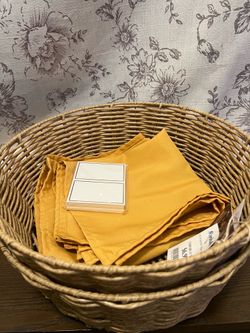 2 large bread baskets with linen