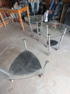 Glass coffee table plus two side tables