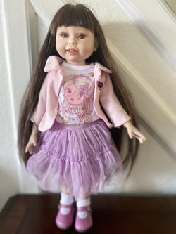 Beautiful doll 18”- pre Owned