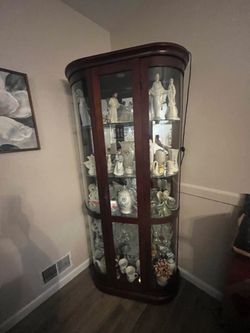Lighted bowed front curio