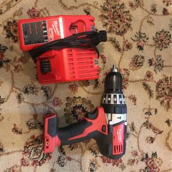Milwaukee Drill /hammer Drill brand new And Charger 