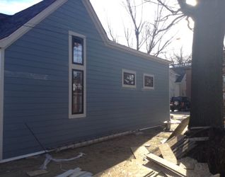 Cement Siding/ Windows