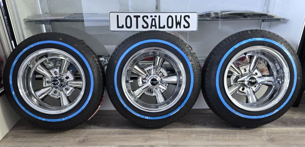 Brand new chrome 13x7 reverse Supreme lowrider wheels in whitewall tires
