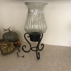 Beautiful decorative  piece with blown glass globe on iron base