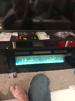 Electric  fireplace entertainment center.
