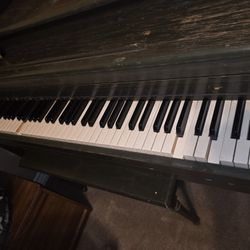 Piano 50$ obo. Can deliver
