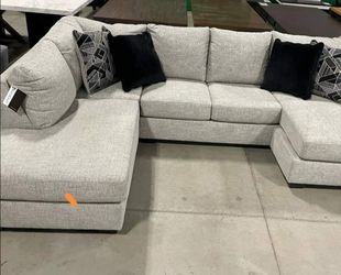 Megginson - Sectional - Gray, Dark / 2-Piece Sectional with Left-Right Arm Facing Chaise