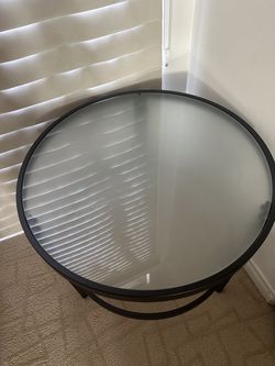 2 opaque glasstop side tables