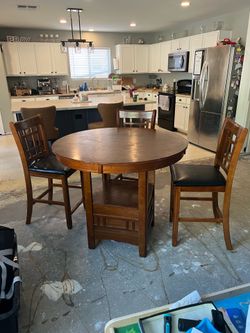 Pub table and 4 chairs
