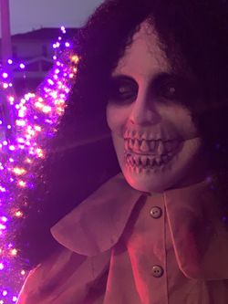 Haunted Living creepy woman animated prop