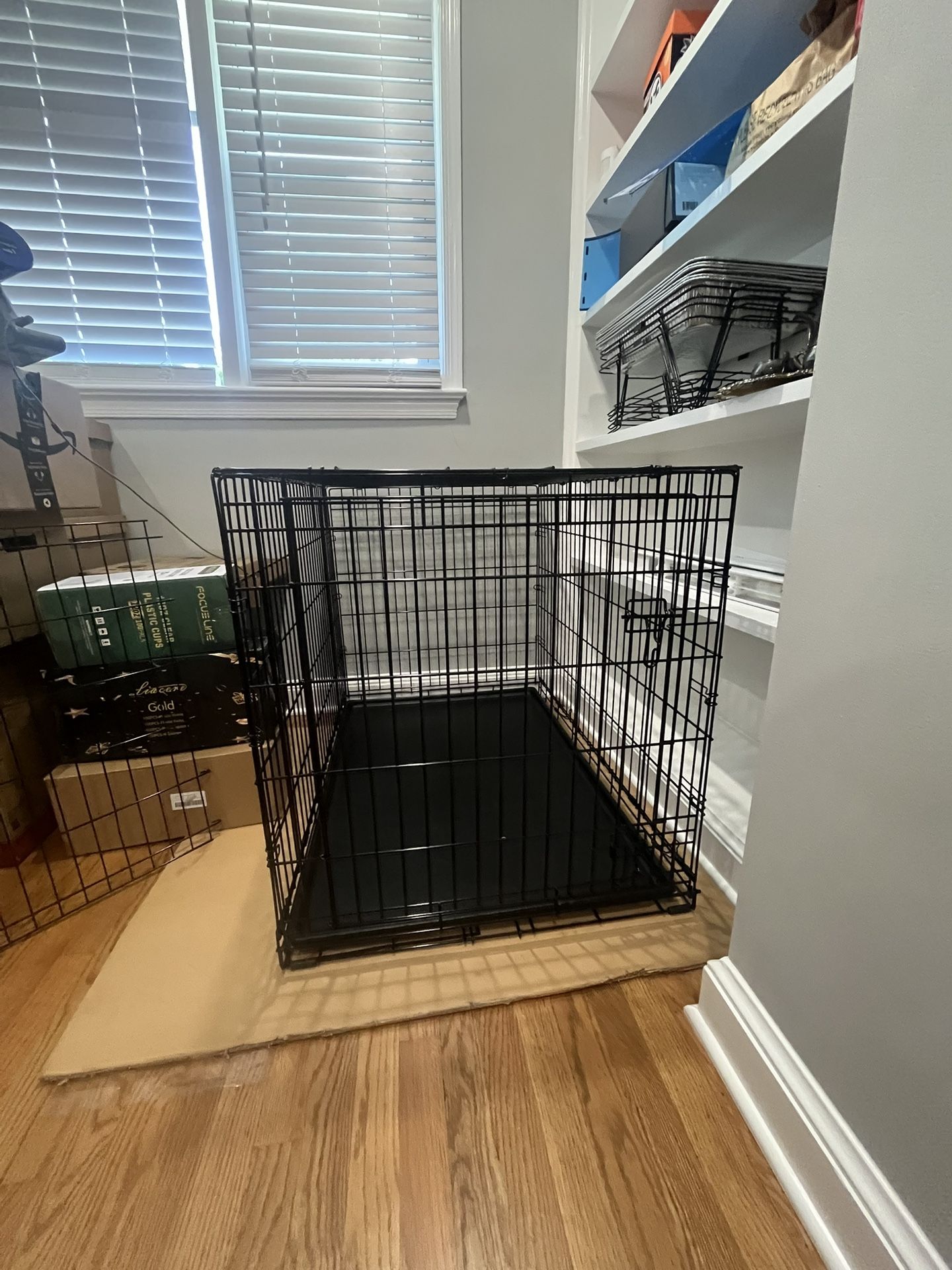 Large Dog Cage. 42"L x 28"W x 30"H $50