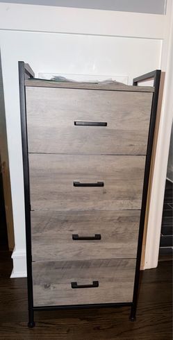 NEW Linsy Home 4-Drawer Vertical Storage Chest in a gray wood finish with a black metal frame.