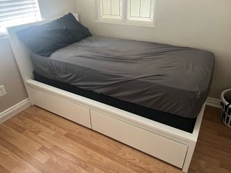 Twin bed , mattress, box spring LIKE NEWand white frame with drawers