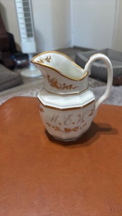 Antique hand painted pitcher