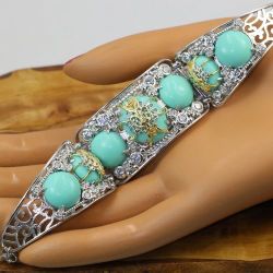 Turquoise bracelet with CZ stones.