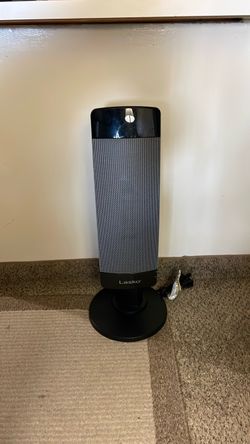 Lasko Tower Space Heater, L/27”inches and W/7”inches. Pre—owned in great operating condition.