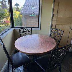 Hammered copper dining table and chairs