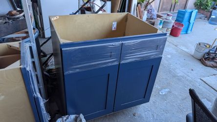 Brand New, kitchen sink cabinet, Blue. $50