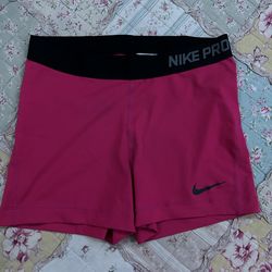 Women’s pink Nike pros