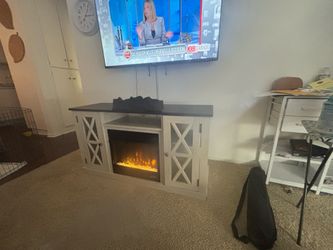 Entertainment center with heater