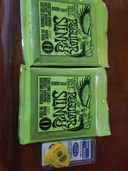 Two Pkg Guitar Strings & 12 Pkg Picks