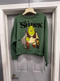Cute green Shrek graphic sweatshirt featuring Shrek, Donkey, and Puss in Boots. Relaxed oversized