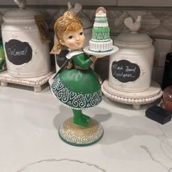 St. Patrick's Day gingerbread girl holding a cake cute as ever new with tags
